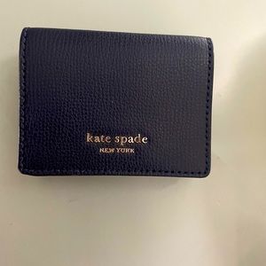 Brand new navy Kate Spade small wallet.